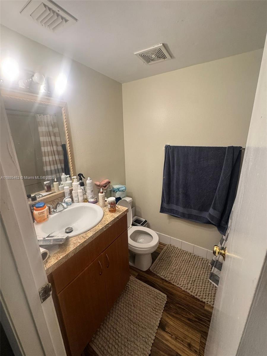 6900 Southwest 39th Street, Unit 106J Davie, FL 33314 - Photo 5 of 9 a bathroom with a sink toilet and shower