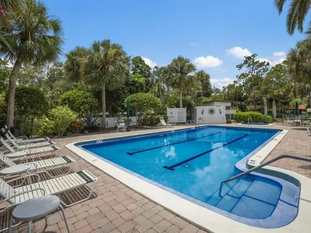 a view of a chairs and table on the terrace