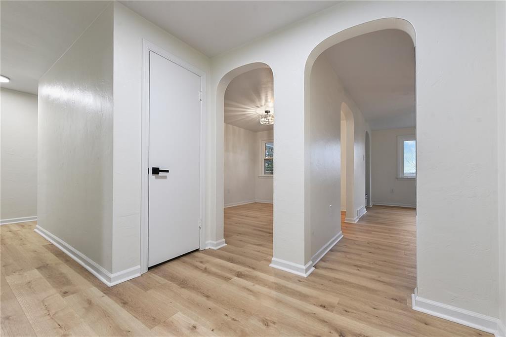 657 Ridge Road Pittsburgh, PA 15205 - Photo 20 of 30 a view of a room with wooden floor and a bathroom