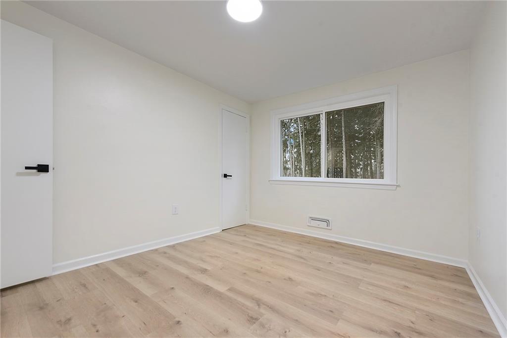 657 Ridge Road Pittsburgh, PA 15205 - Photo 24 of 30 a view of empty room with wooden floor and fan