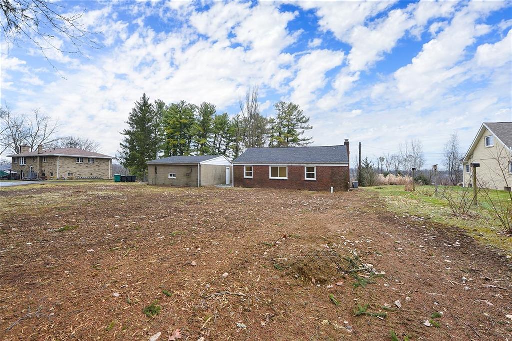 657 Ridge Road Pittsburgh, PA 15205 - Photo 29 of 30 a front view of a house with a yard