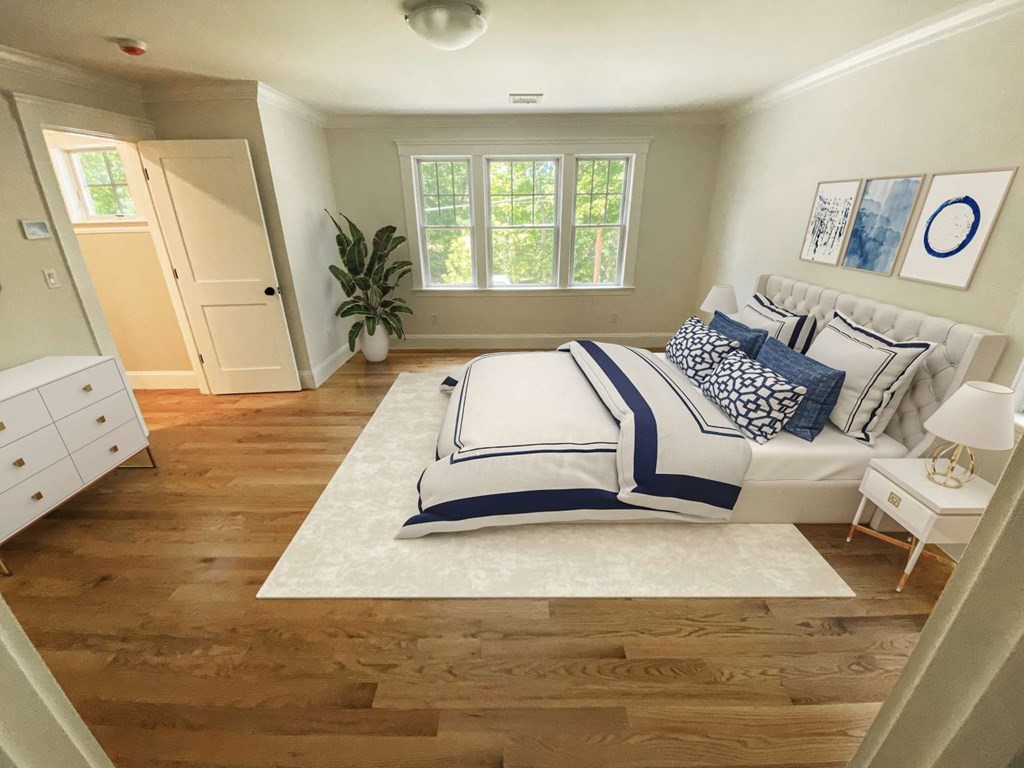 3 Wellesley Avenue, Unit 3 Needham, MA 02494 - Photo 11 of 19 a living room with a bed