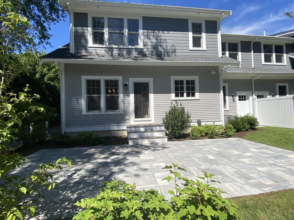 3 Wellesley Avenue, Unit 3 Needham, MA 02494 - Photo 14 of 19 a front view of a house with garden