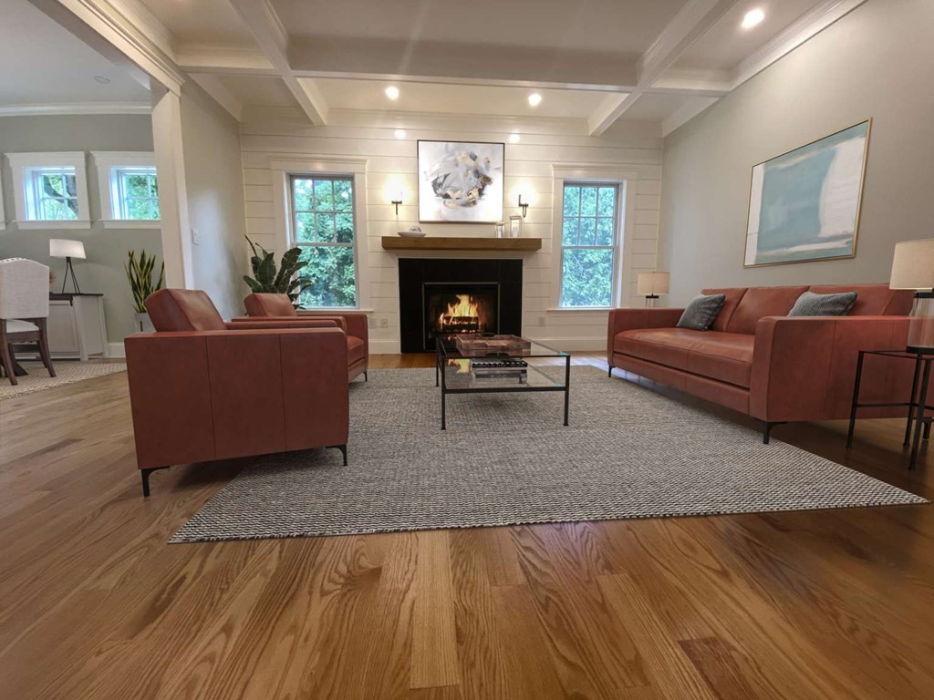 3 Wellesley Avenue, Unit 3 Needham, MA 02494 - Photo 2 of 19 a living room with furniture and a fireplace