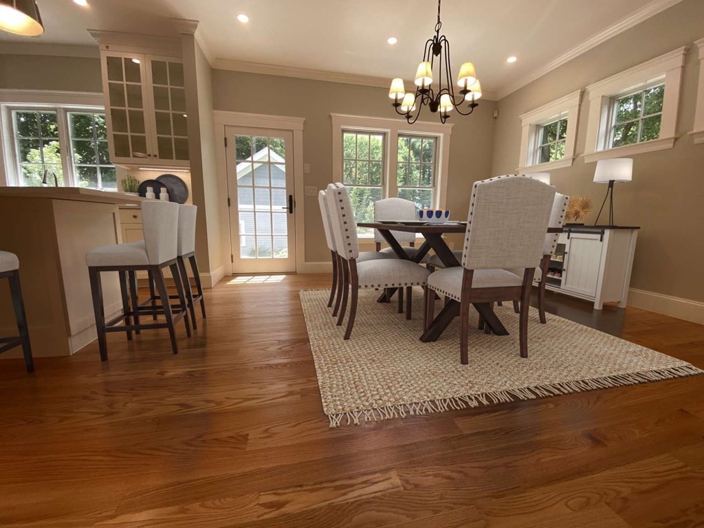 3 Wellesley Avenue, Unit 3 Needham, MA 02494 - Photo 4 of 19 a view of a dining room with furniture window and wooden floor