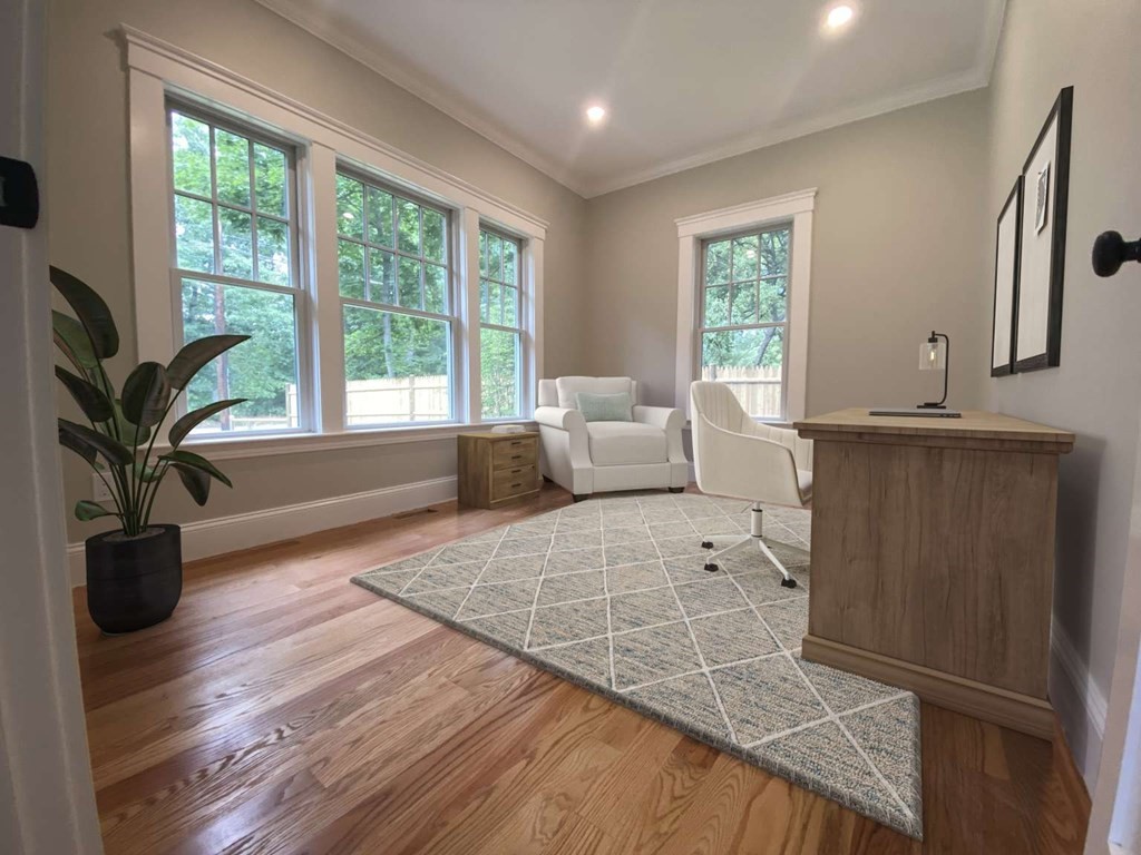 3 Wellesley Avenue, Unit 3 Needham, MA 02494 - Photo 7 of 19 a living room with furniture large window and wooden floor