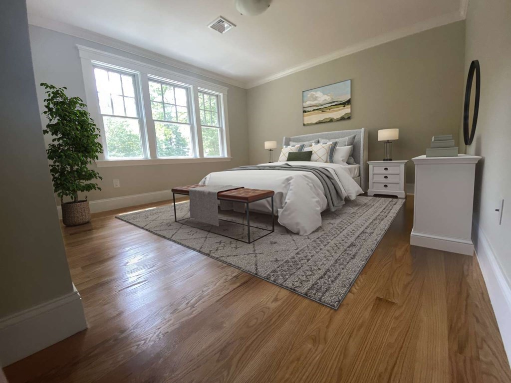 3 Wellesley Avenue, Unit 3 Needham, MA 02494 - Photo 8 of 19 a bedroom with a large bed and a window