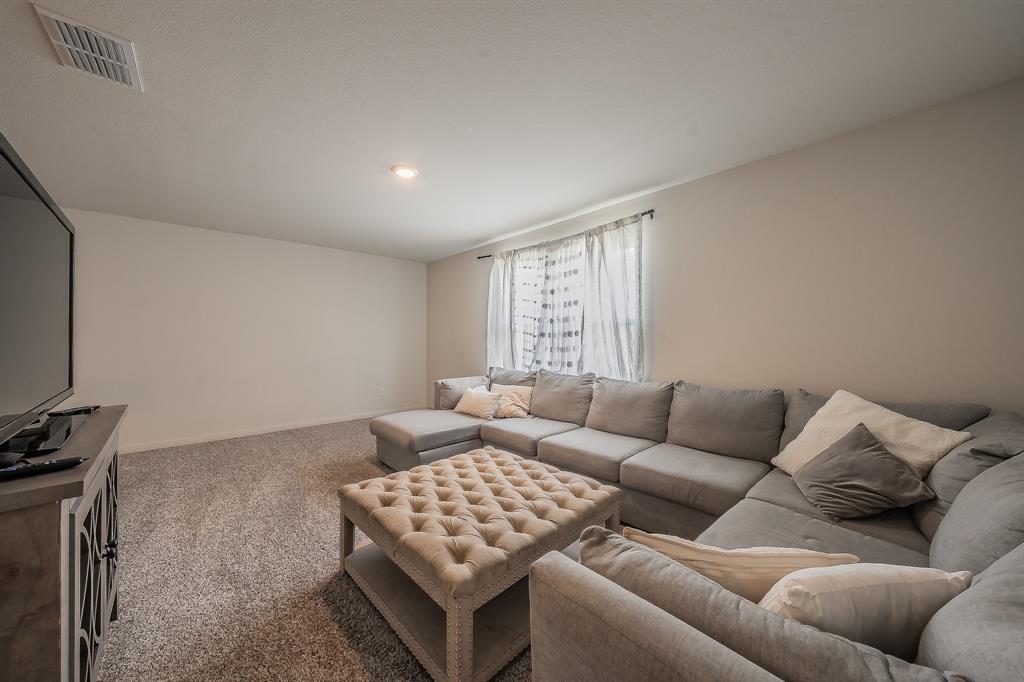 8125 White Sulphur Road Ponder, TX 76259 - Photo 20 of 38 Carpeted room with neutral wall tones and a single window