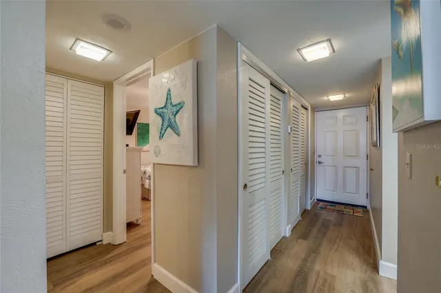 a bedroom with a bed dresser and a window