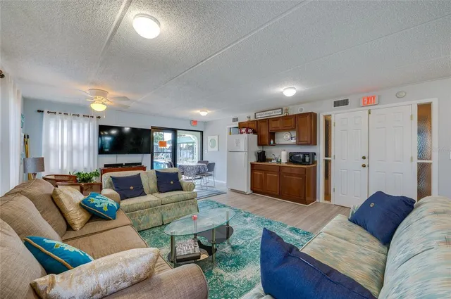 a view of a swimming pool with a patio