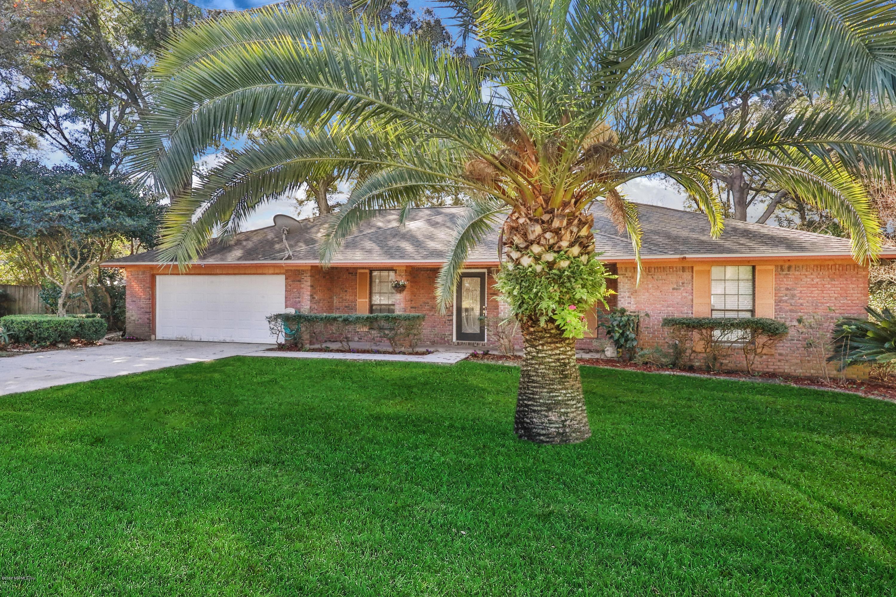 1810 Rambling Ridge Lane Jacksonville, FL 32225 - Photo 1 of 30 front with palm