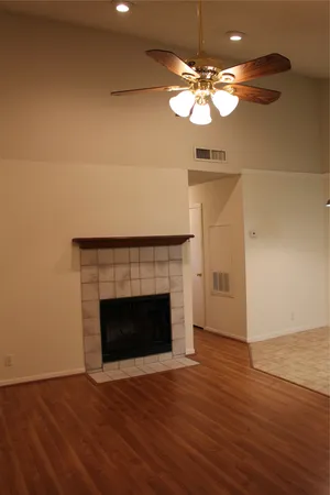 a view of gallery with wooden floor