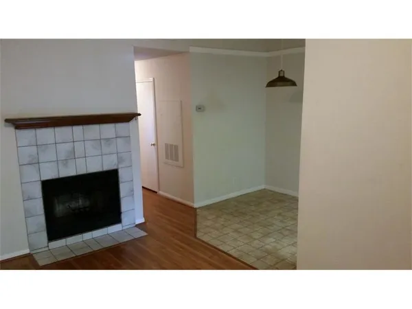 a open living room with a fireplace