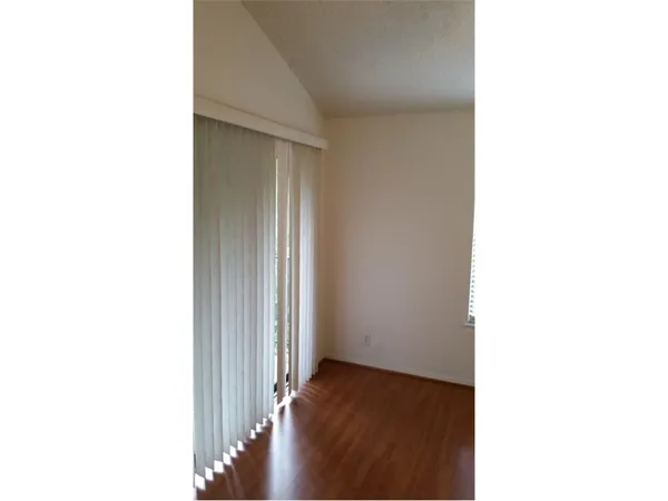 a view of a room with door open