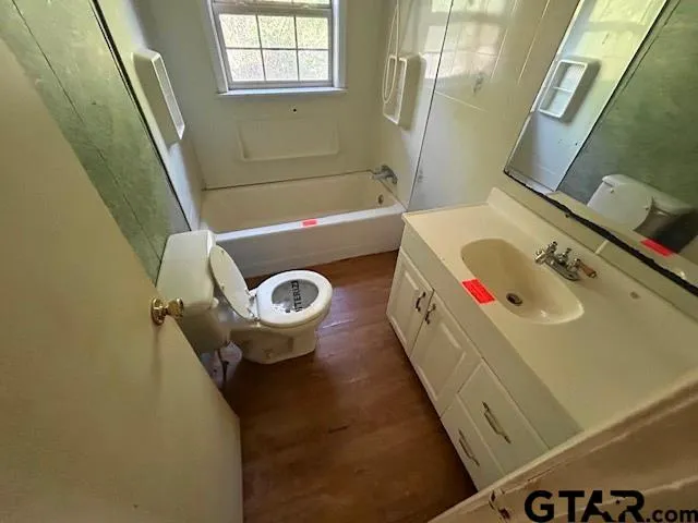 a bathroom with a sink and bathtub
