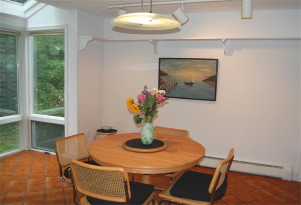 11 John Poulter Road Lexington, MA 02421 - Photo 13 of 27 a dining room with furniture and window