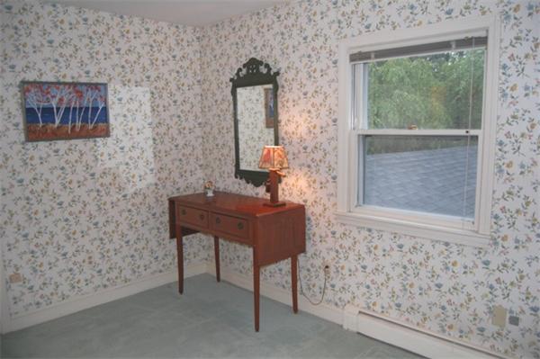 11 John Poulter Road Lexington, MA 02421 - Photo 22 of 27 a bathroom with a sink and a mirror