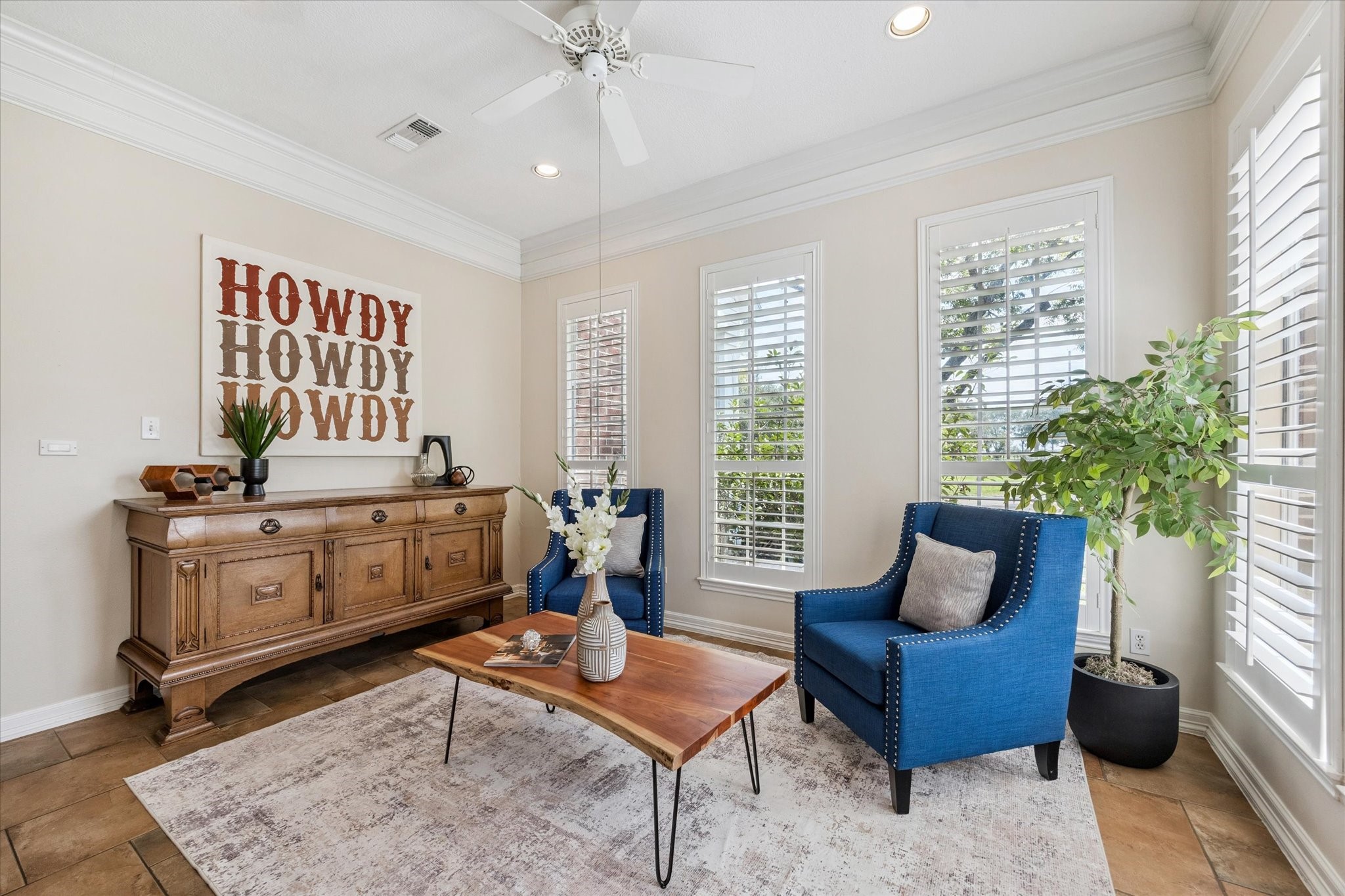 3577 Katy Hockley Road Katy, TX 77493 - Photo 26 of 50 An intimate sitting area with tall windows offers a quiet spot for conversation or relaxation.