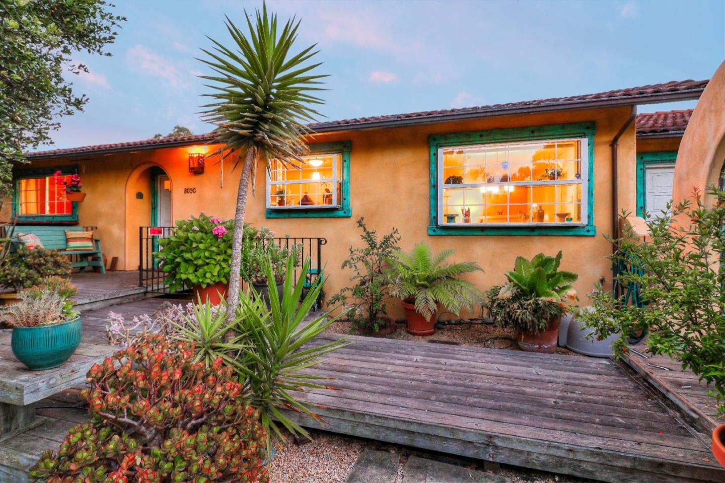 809 C Lewis Road Watsonville, CA 95076 - Photo 1 of 41 a potted plant sitting in front of a house