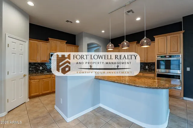 a view of a room with window and wooden floor