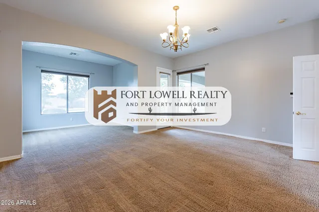 a view of a room with a wooden floor
