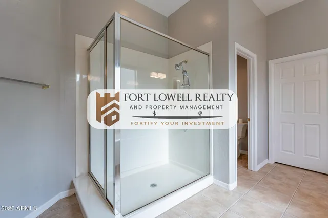 a view of a room with window and wooden floor
