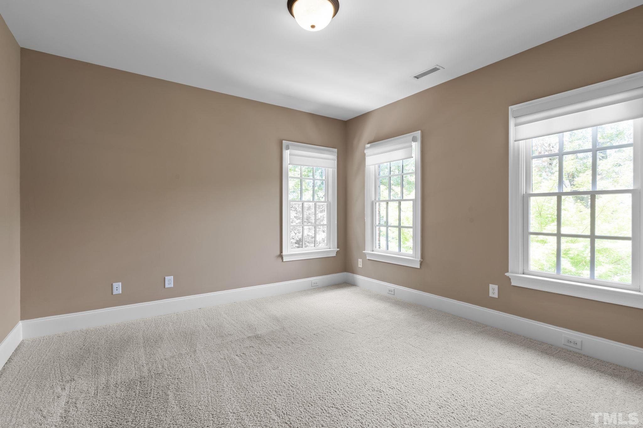 3329 Hampton Road Raleigh, NC 27607 - Photo 31 of 46 a view of an empty room with a window