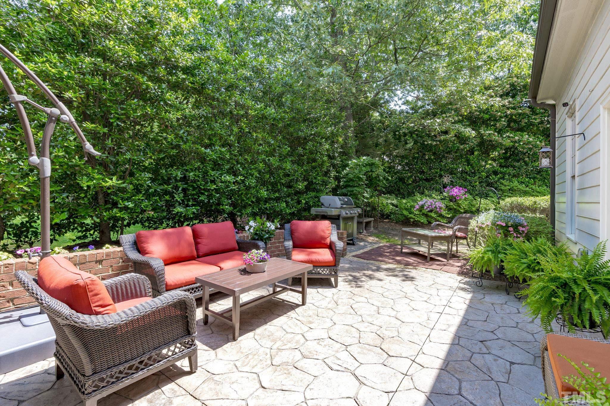 3329 Hampton Road Raleigh, NC 27607 - Photo 40 of 46 a backyard of a house with outdoor seating