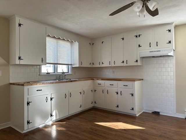 396 Brown Street Attleboro, MA 02703 - Photo 13 of 19 a kitchen with granite countertop white cabinets and a stove