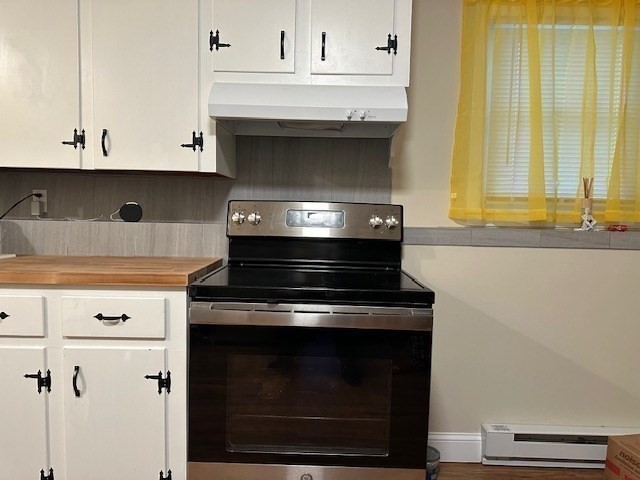 396 Brown Street Attleboro, MA 02703 - Photo 14 of 19 a stove top oven sitting inside of a kitchen