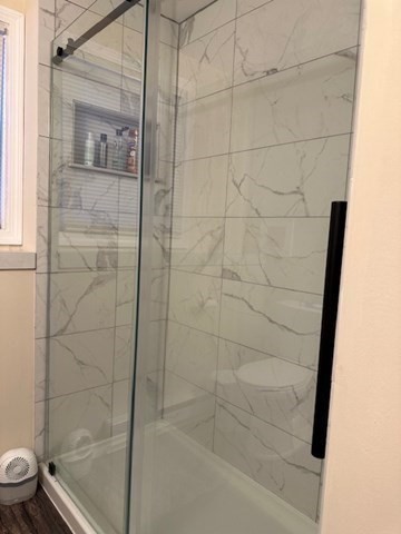 396 Brown Street Attleboro, MA 02703 - Photo 8 of 19 a bathroom with a shower and a toilet