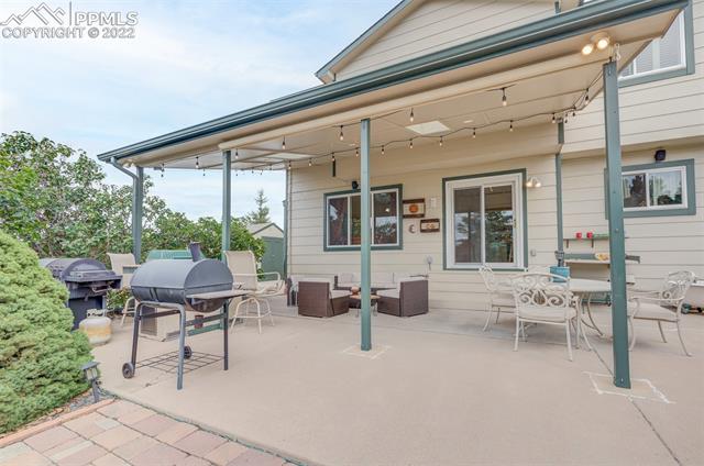 8252 Tompkins Road Peyton, CO 80831 - Photo 41 of 50 Patio, all Furniture and grills can be included, except for ski chairs. Notice the operational Speakers, Lighting, and 2 x Sunroofs.