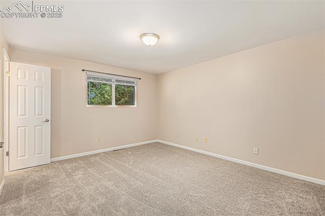 4514 Ridgeglen Road Colorado Springs, CO 80918 - Photo 19 of 29 Bedroom with new carpet