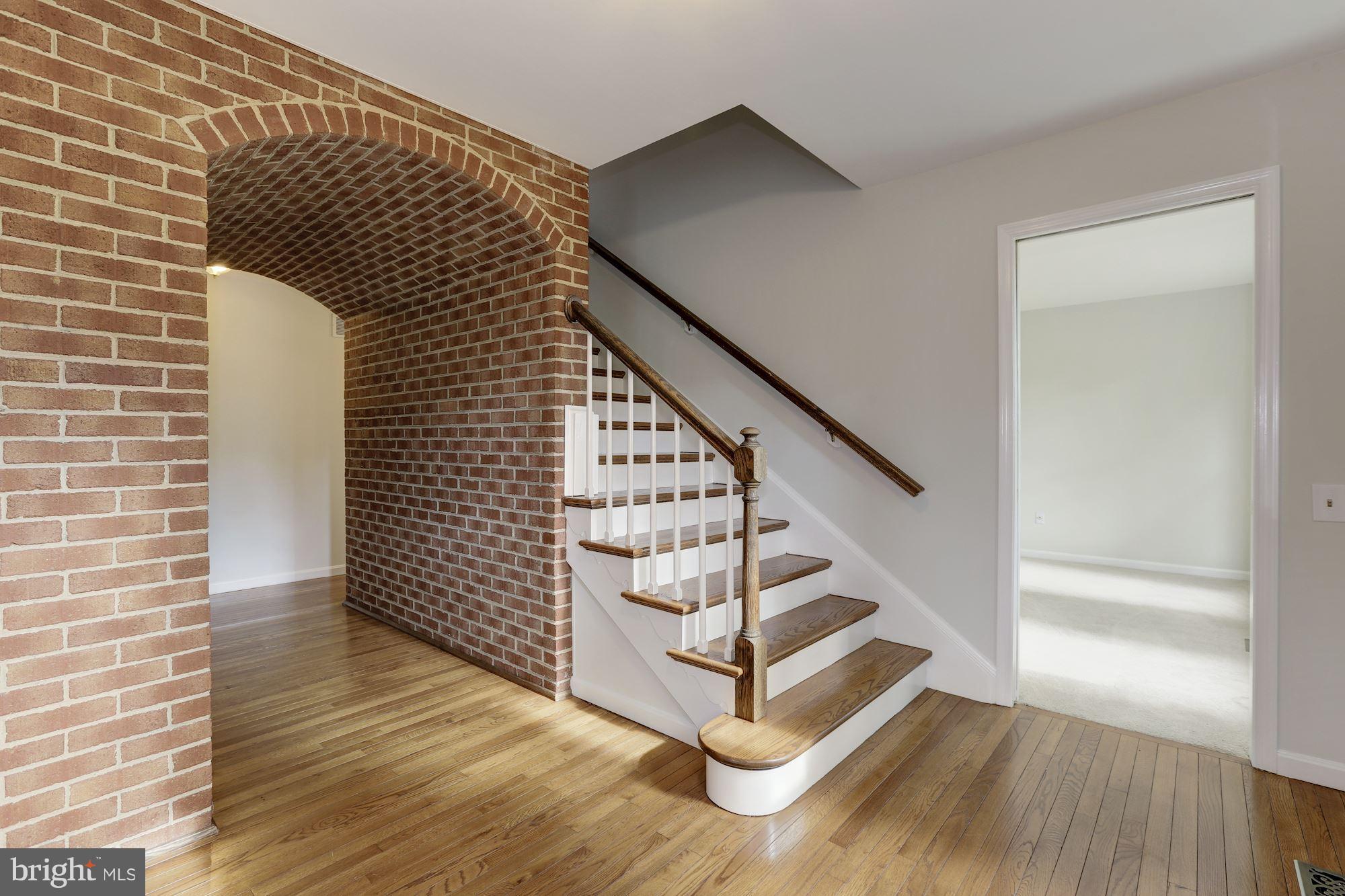 1072 Mt Airy Road Davidsonville, MD 21035 - Photo 5 of 38 Unique brick entry foyer.