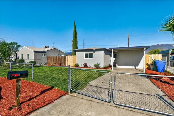 a house view with a backyard space