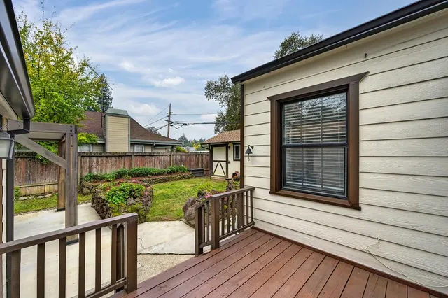 a view of two chairs in the balcony