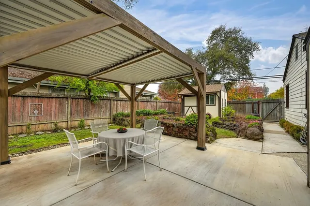 a patio with yard and patio