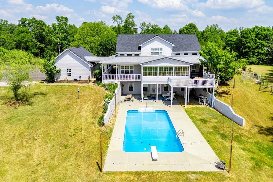 575 Liberty Church Road Carrollton, GA 30116 - Photo 9 of 95 a view of house with a swimming pool