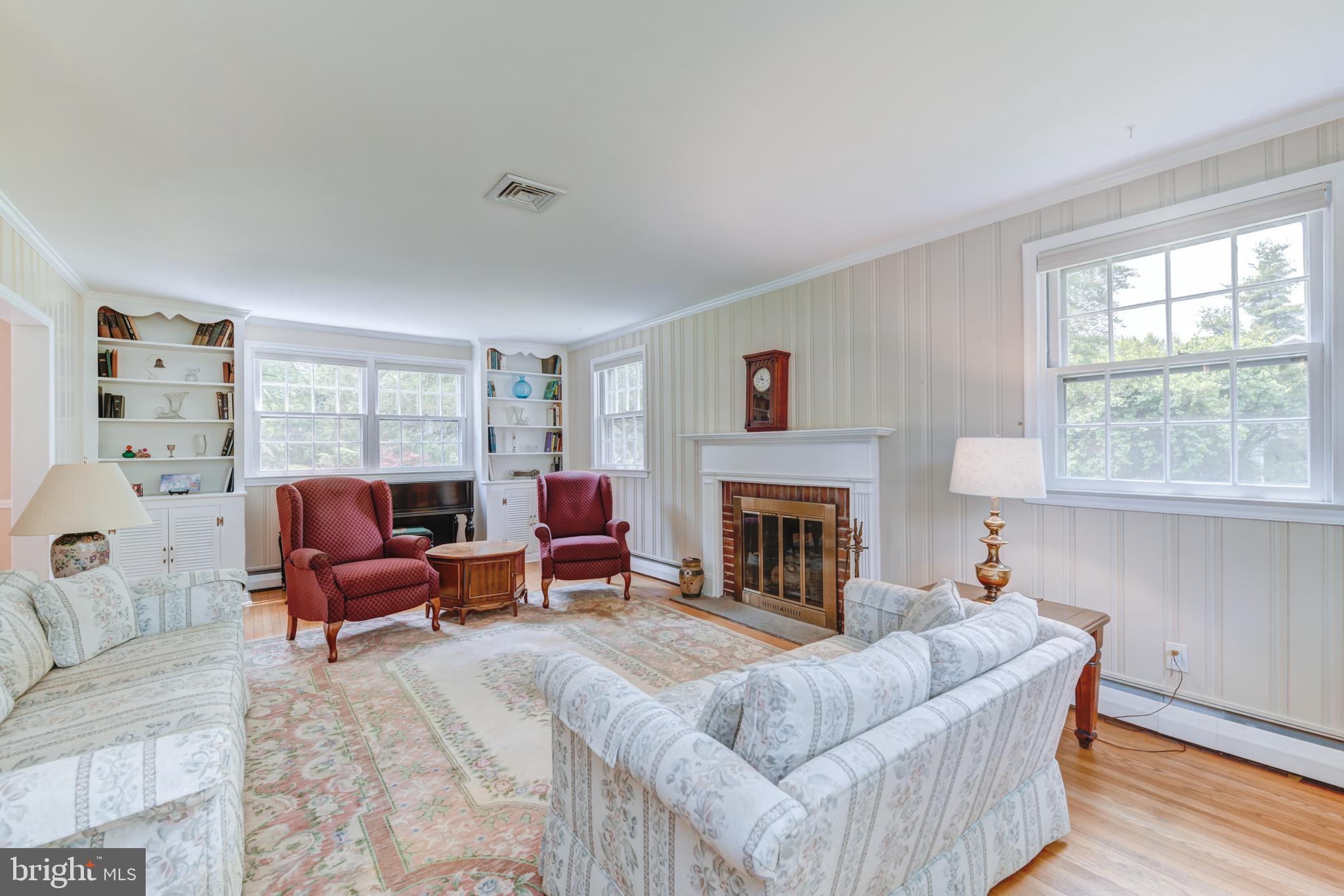 920 Davis Road Ambler, PA 19002 - Photo 5 of 39 Living room with built-ins and fireplace