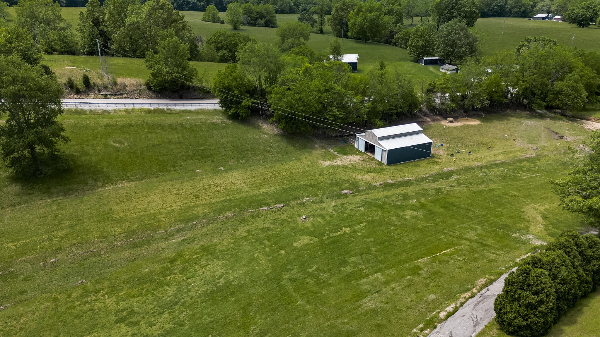 110 Womack Road Portland, TN 37148 - Photo 13 of 44 an aerial view of a house with a yard