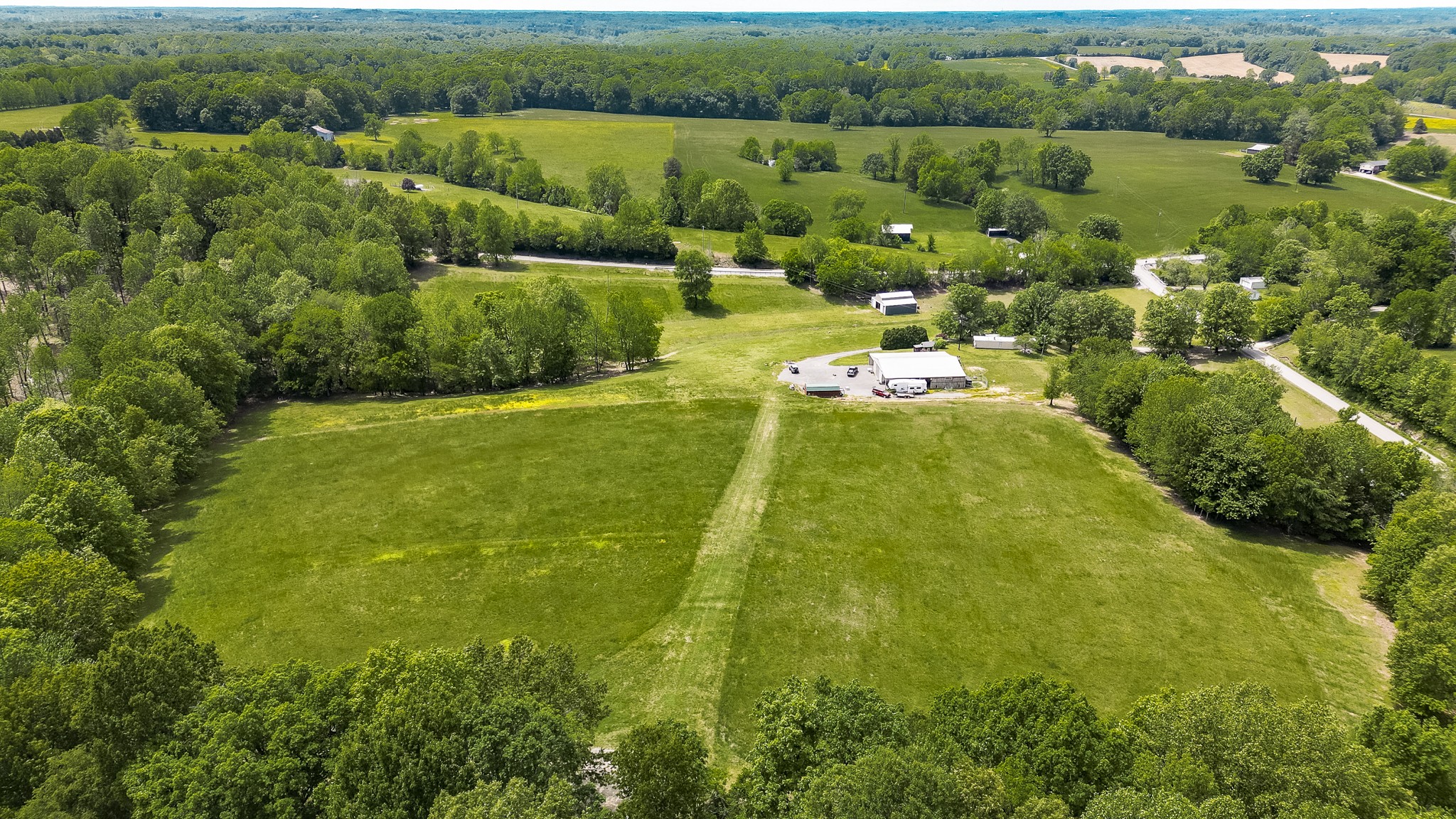 110 Womack Road Portland, TN 37148 - Photo 17 of 44 a view of a lake with a city