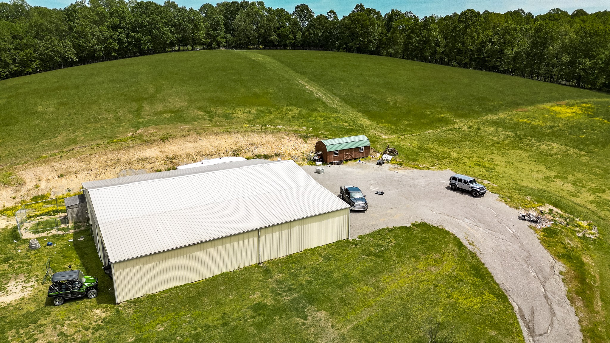 110 Womack Road Portland, TN 37148 - Photo 23 of 44 a view of a swimming pool with a yard