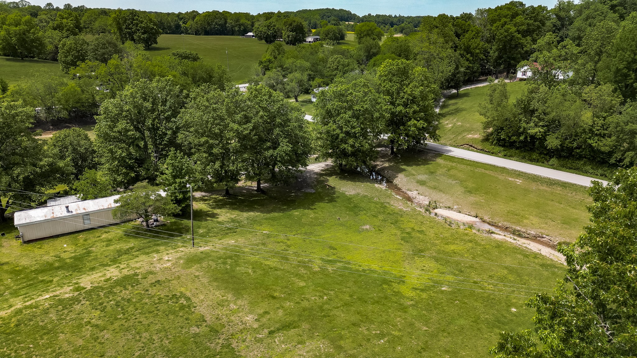 110 Womack Road Portland, TN 37148 - Photo 24 of 44 a view of a lake with a mountain