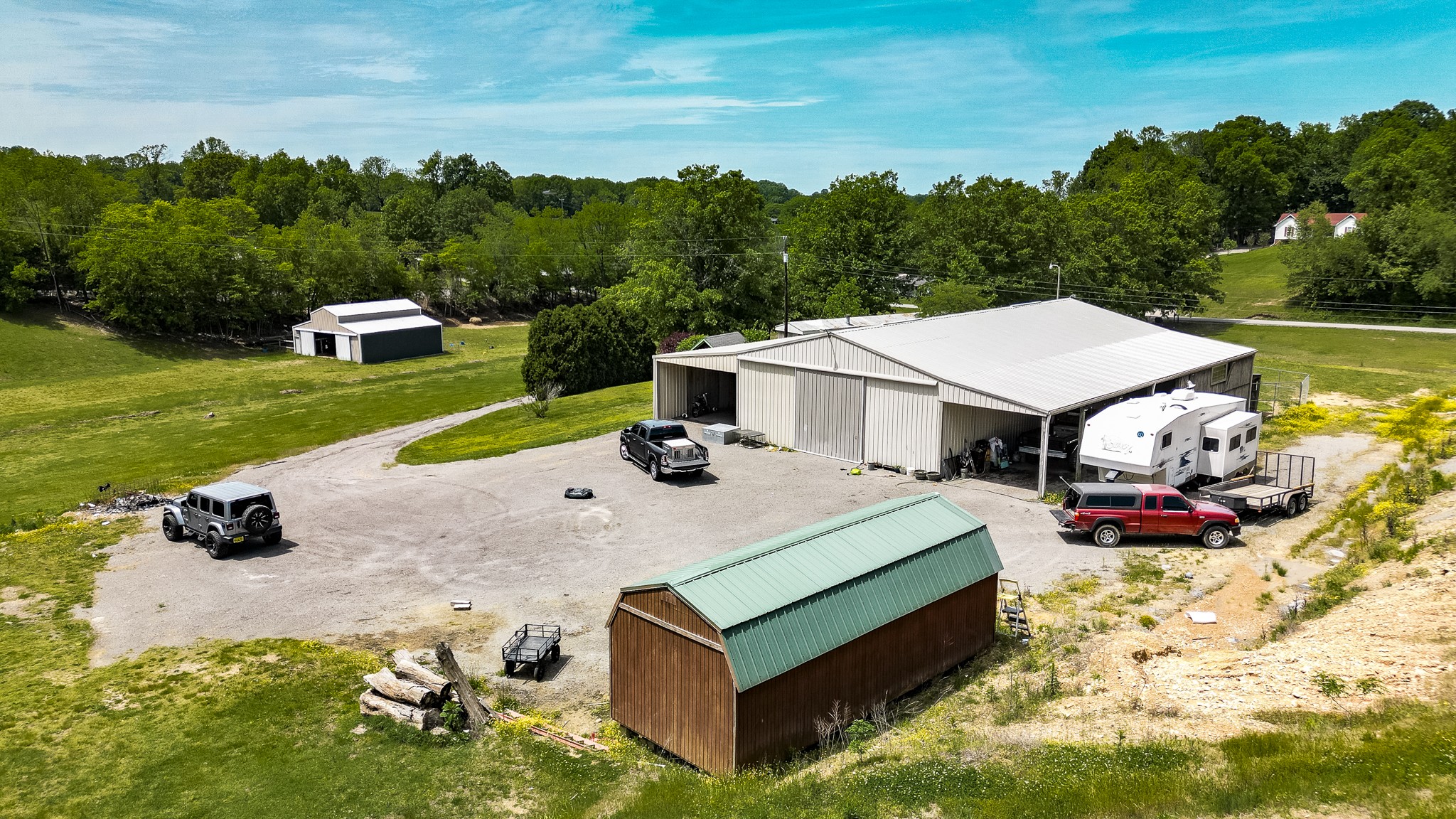 110 Womack Road Portland, TN 37148 - Photo 33 of 44 an aerial view of a house with a garden