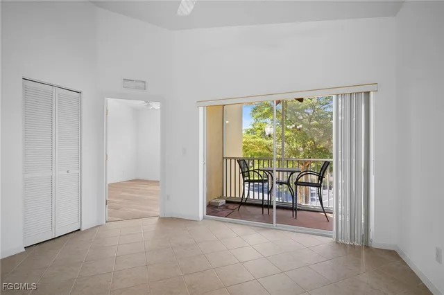 a view of a room with sliding door and mountain view