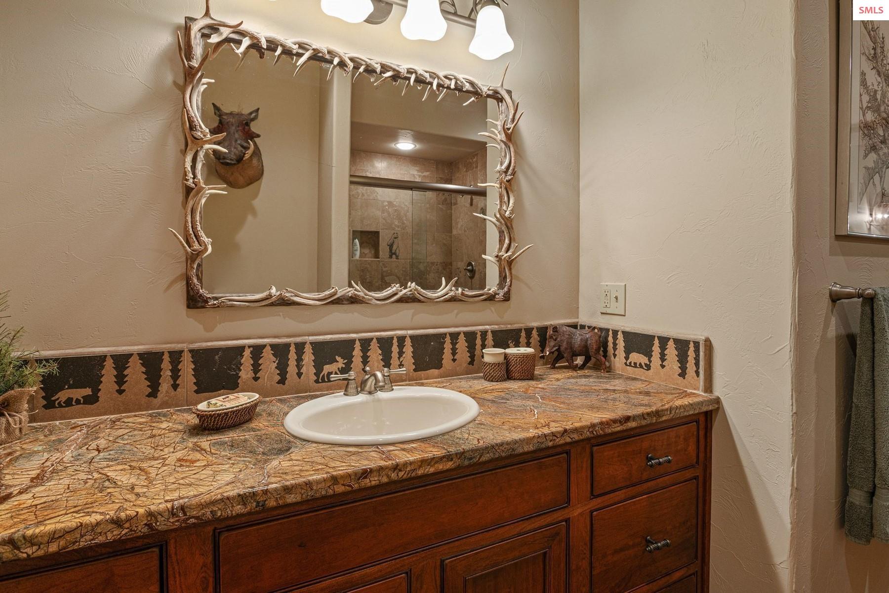 526 Roop Road Cocolalla, ID 83813 - Photo 41 of 100 Downstairs full bathroom