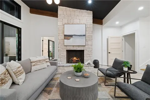 a view of a two chairs in the balcony