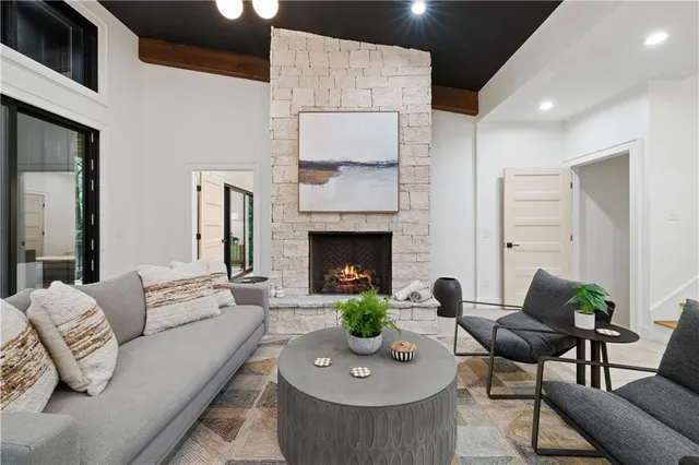 a view of a patio with a table chairs and a backyard