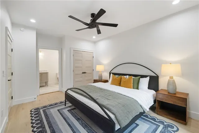 a view of a balcony with chairs and wooden floor