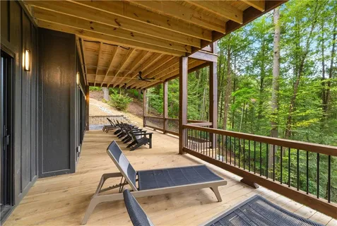 a view of a yard with large trees